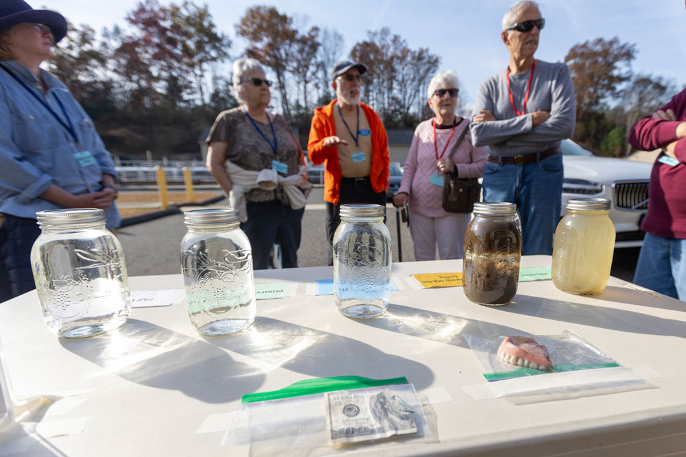 Guests tour the Heritage Village Wastewater Facility during an open house