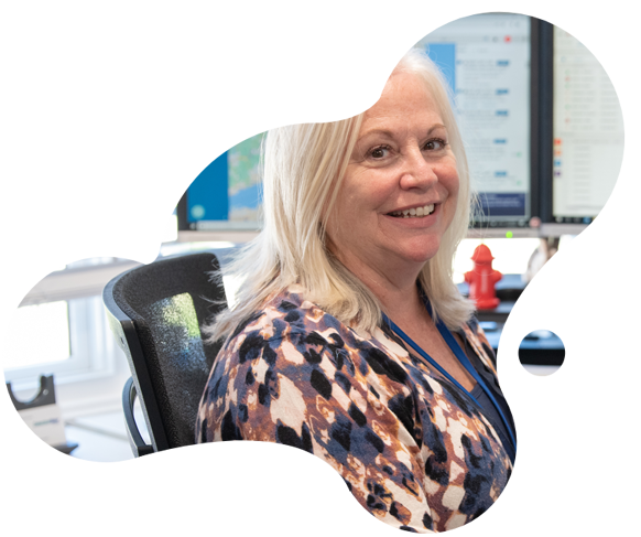 CT Water employee at her desk looking at the camera