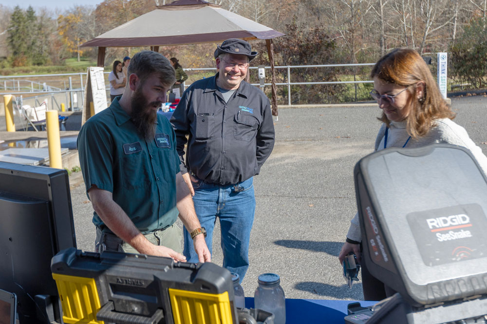 Guests tour the Heritage Village Wastewater Facility during an open house